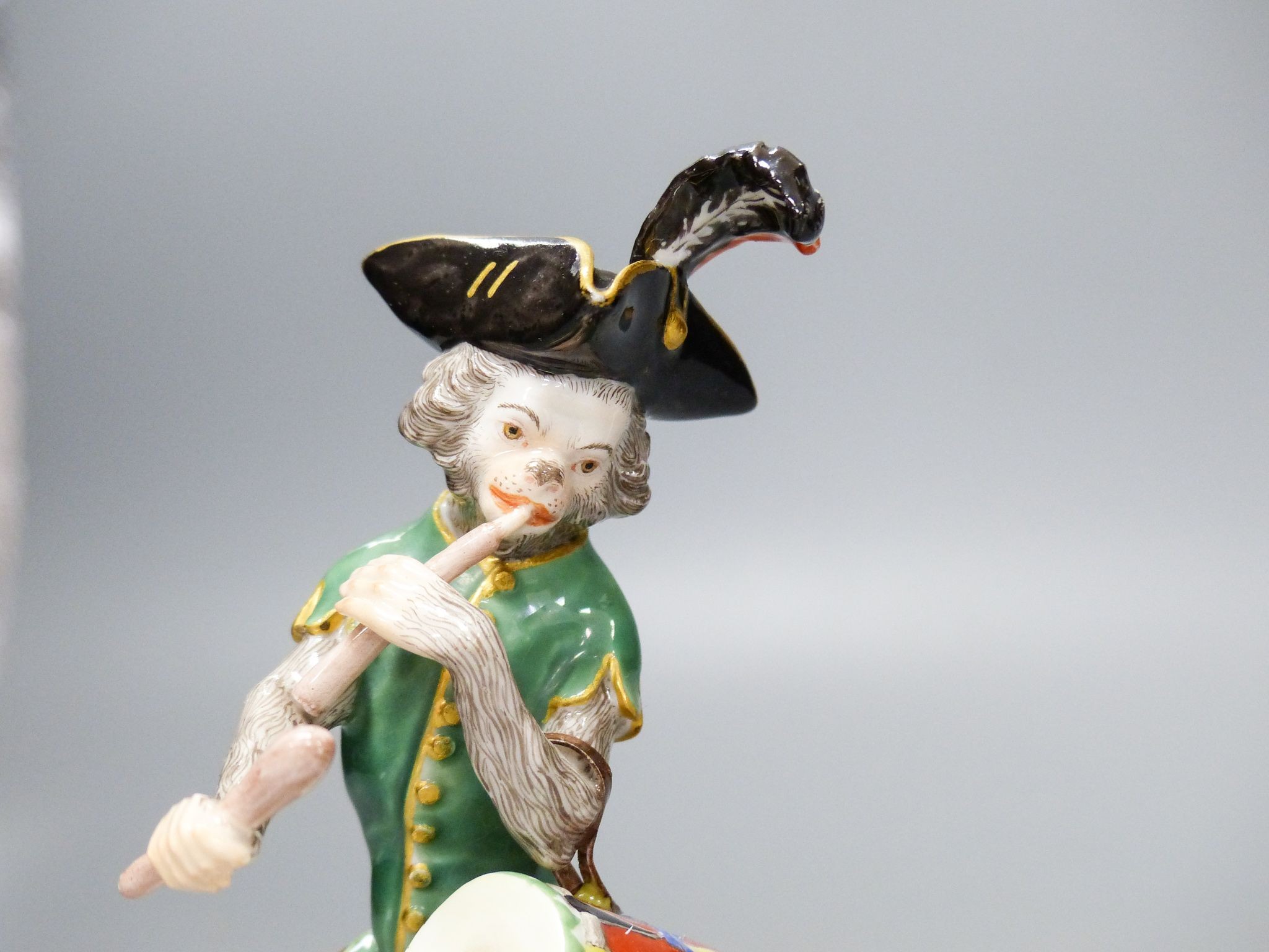 Two 19th century Meissen monkey band figures, tallest 14.5 cm 14cm